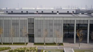 The picture shows one of the applied energy efficiency measures - Integrated solutions for PV, storage and heating in the Sino-German Center office building in the pilot park