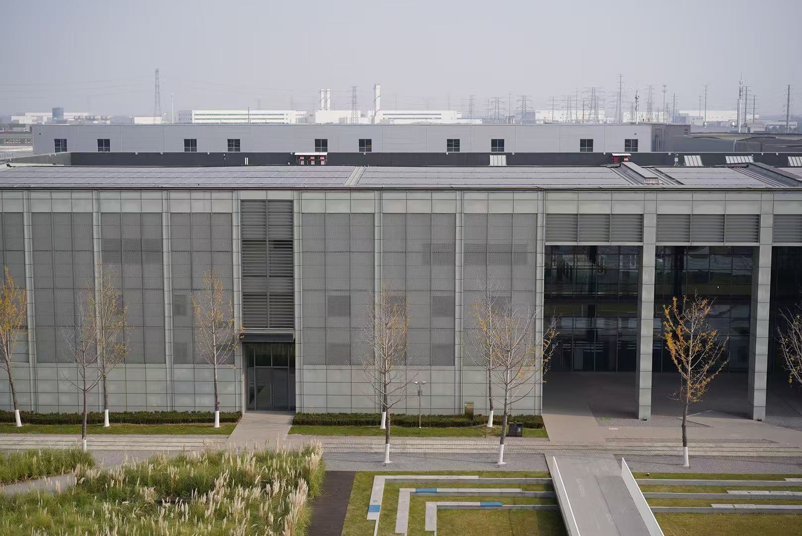 The picture shows one of the applied energy efficiency measures - Integrated solutions for PV, storage and heating in the Sino-German Center office building in the pilot park